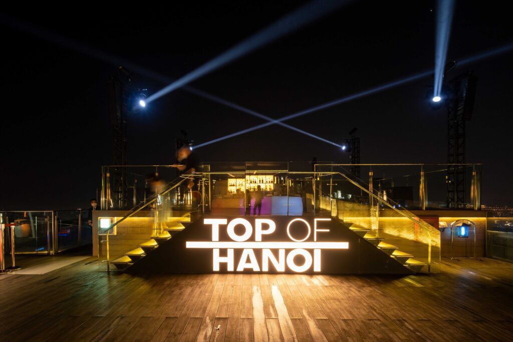 Rooftop bar in Vietnam with city skyline and evening atmosphere