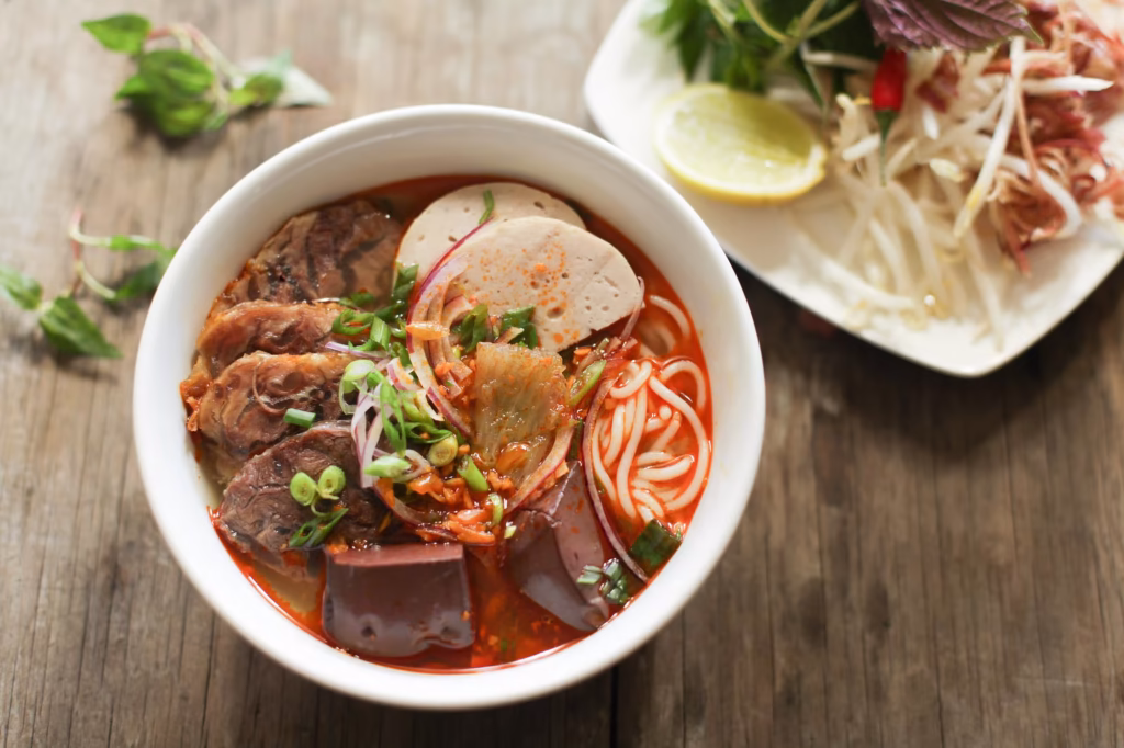 Discovering Vietnam's Vibrant Street Food Culture: A Guide for the Adventurous Traveler 4 bun bo hue bowl.jpg