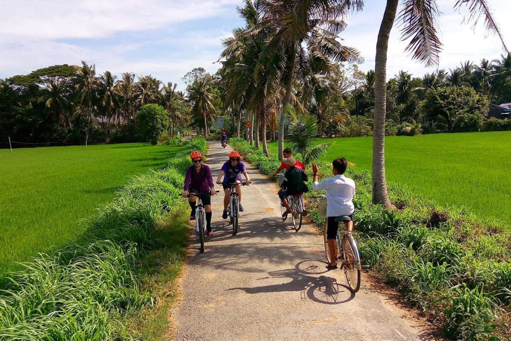 Exploring Vietnam's Diverse Landscapes Through VietOne Travel's Curated Experiences 1 cycling mekong delta 1