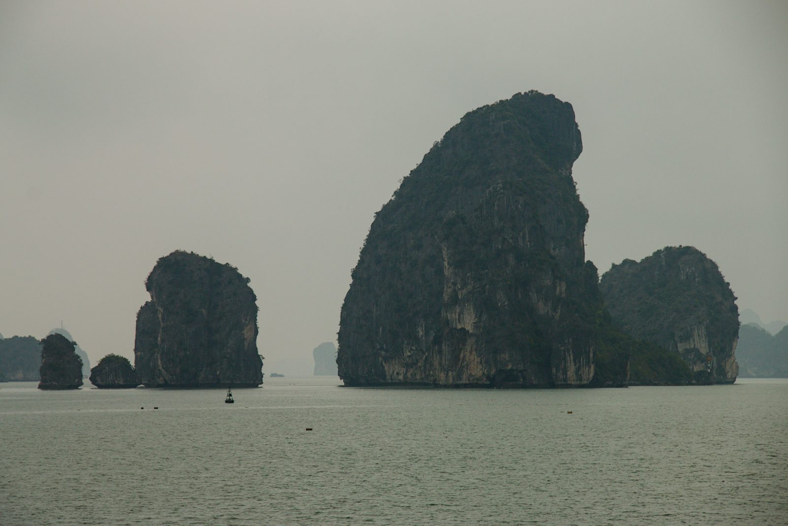 Misty winter karsts on a Ha Long Bay cruise
