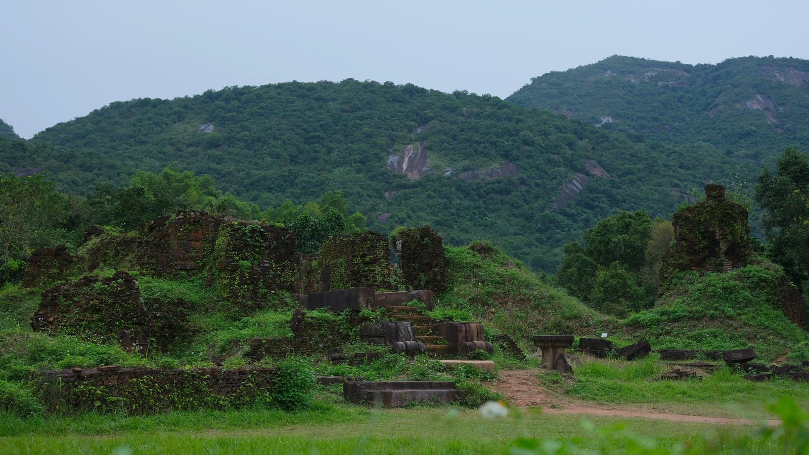 My Son Sanctuary group A ruins below forested hills